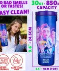 Girl holding Demon Hunters 30 Ounce Tumbler with Straw and Handle, featuring colorful character designs, insulated stainless steel, ideal for gaming.