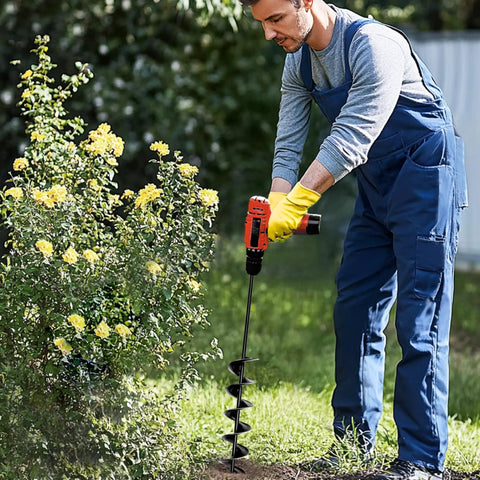 Person using 32 Inch Long Garden Auger Drill Bit For Planting Bulbs And Post Holes, Heavy Duty Three Eighths Inch Hex Drive