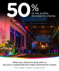 Outdoor evening scene with Vintage Outdoor String Lights 24ft With 12 RGB Acrylic Bulbs illuminating a backyard, from image showing 50% charity donation text.