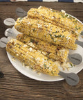 Corn on the cob with stainless steel holders from 36 Piece Grill Tool Set With Spatula Fork Tongs Basting Brush Replacement