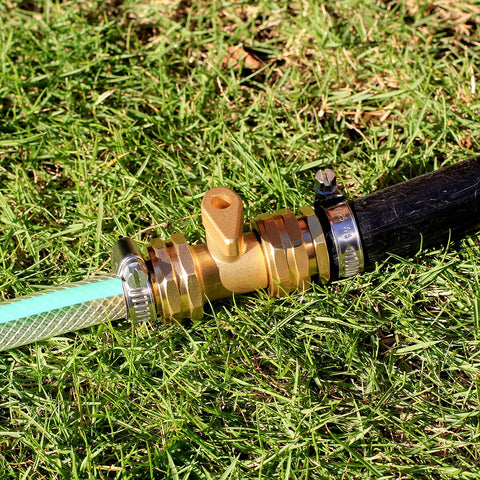 Solid Brass Garden Hose Repair Kit with Stainless Steel Clamps, Swivel Fittings and Three Quarter Inch Adapters on Grass