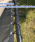 Close-up of black waterproof vinyl mesh replacement with rope for patio curved hanging lounge chair and chaise lounger.