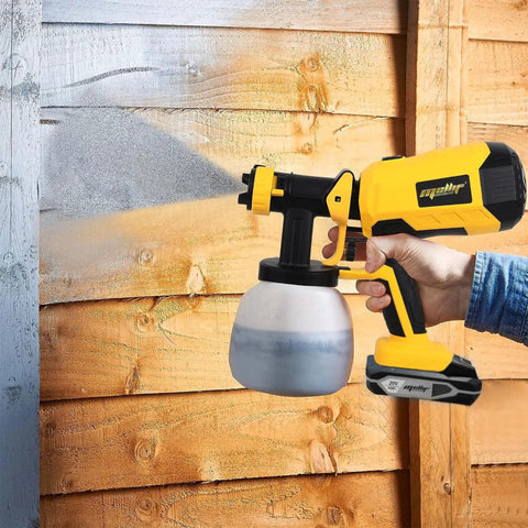 Person using Brushless HVLP Cordless Paint Sprayer 1200ML Cup With 4 Nozzles And 3 Spray Patterns That Works With 20V Batteries, Battery Not Included on wooden fence