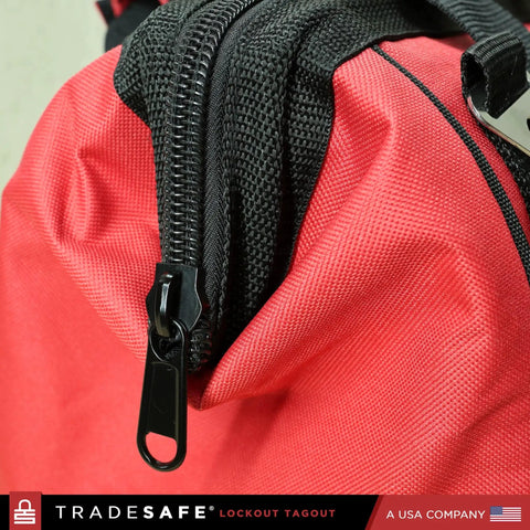 Close-up of zipper on Heavy Duty Lockout Tagout Bag, Large LOTO Tool Organizer, durable red canvas material.