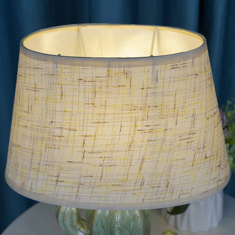 Close-up of beige fabric lampshade on Cactus Desk Lamp With Fabric Lampshade And Sturdy Ceramic Base, Modern Bedside Nightstand Light