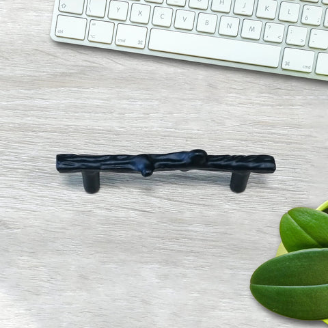 Six Piece Tree Branch Cabinet Handles Set In Black Twig Style Drawer Pulls with keyboard backdrop