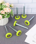 Top Shelf 15 Pack 1.8 Inch Green Nylon Garage Door Rollers Featuring Quiet 6200ZZ Precision Ball Bearings For Lightning Smooth Residential Door Replacement displayed with flowers.