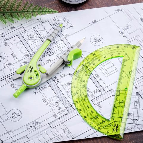 Geometry Compass And Protractor Set For Math And Drafting, 6 Inch Compass With Protective Case, Green Color, on blueprint surface