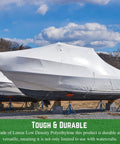 Tough As Nails String Reinforced Shrink Wrap Roll 16 X 25 Feet waterproof film covering a boat for winter storage outdoors.