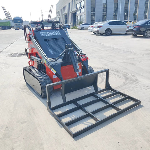 Small But Mighty Mini Skid Steer Loader With Leveler, 1800lbs capacity, on concrete, front view.