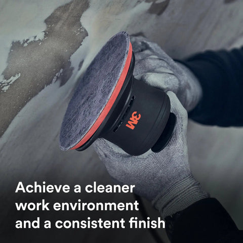 Worker using Xtract Cubitron II Hookit Clean Sanding Film Disc 775L 220 Grit 5 Inch for paint prep and finish on wall surface.