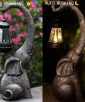 Outdoor Solar Powered Elephant Garden Statue With LED Lantern Lights, waterproof resin decor in day and night settings