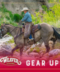 Rider on horseback wearing Black Bridle Leather Spur Straps Half Inch Wide By 19 Inches Long with darkened edges and nickel hardware