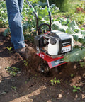 Cultivator With 43Cc 2 Cycle Viper Engine 6 To 10 Inch Adjustable Width 8 Inch Maximum Depth in use for garden tilling