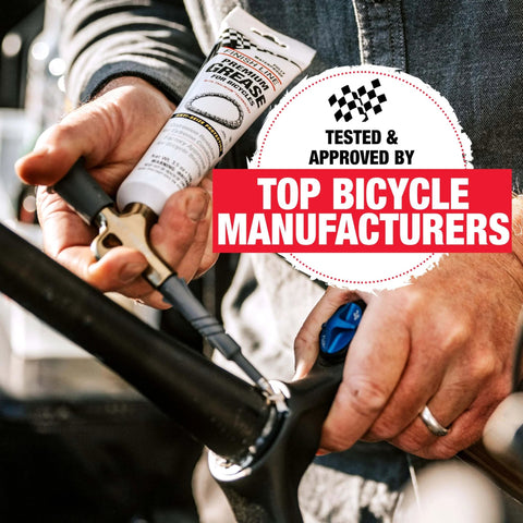 Person applying Extreme-pressure All Purpose Bicycle Grease For Every Part Waterproof Extreme Pressure Protection For Bearings Threads And Pivots