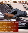 Gloved hand using Dope Leather Brush For Car Detailing With Horsehair Bristles And Wood Handle Soft On Leather Seats Upholstery Carpet Interior Trim Shoes And Furniture Deep Clean Stains In Seams And Tight Gaps on soapy car leather seat