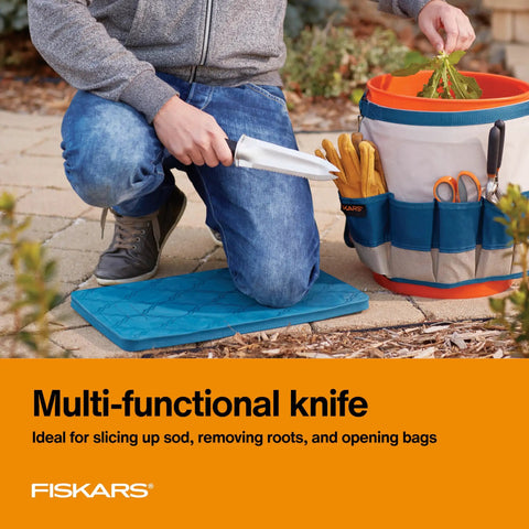 Person using Steel Garden Knife Multi Purpose Weeding And Digging Tool for planting with tool bag and kneeling pad.