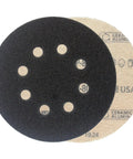 Heavy Duty 80 Grit Ceramic Sanding Discs With Hook And Loop Backing For Quick Change Resin Bonded Prepping, Rust Removal, Fillers Primers And Auto Body Work Professional Finish viewed from above showing black abrasive surface with holes.
