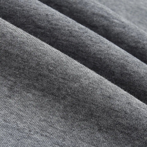Close-up of soft grey fleece fabric from Three Pack Boys Sweatpants Fleece Joggers with Zipper Pockets Cozy Everyday Lounge and Gym Class Ready