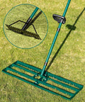 Lawn Leveling Rake 33x10 Inch With 78 Inch Adjustable Back Saving Handle Pro Grade Heavy Duty Stainless Steel Leveler Tool, shown on grass