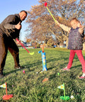 Toddler Golf Club Set With Pull Cart For Little Pros Ages One To Five Includes Super Lightweight Gear and soft balls used in a park setting.