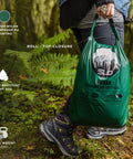All In One Camping Hammock Kit With Bug Net And Rain Fly For Easy Setup Pro Grade Ripstop Nylon bag in forest setting