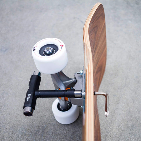 Reds Bearings 8 Pack with tool on skateboard setup showing 608 size bearings for smooth fast rolling ideal for daily use