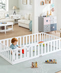 Twin Size Solid Wood Montessori Floor Bed Frame With Secure Guard Rail And Playful Front Door Design, child playing inside with toys.