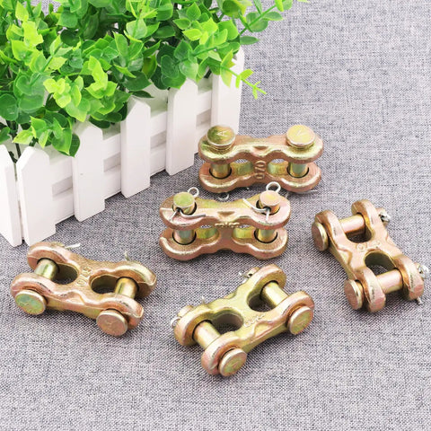 8 Pack 3/8 Double Clevis Link Heavy Duty Zinc Plated Alloy Steel Chain Repair Hardware, showing five connectors on grey fabric.