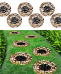 Six Piece River Rock Stepping Stone Mat Set, 10 Inch Round Polished Pebble Pavers For Yard arranged on grass pathway