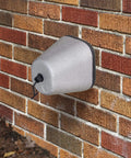 Outdoor Foam Faucet Covers Oval 4 Pack No Fuss Protect Your Faucets From Freezing Wind And Chill Easy To Install Eco Friendly And Energy Efficient Made In USA Gray on a brick wall