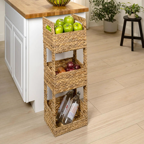 Gunter 35.5 Inch Coastal Handwoven Water Hyacinth 3 Tier Freestanding Storage Tower beside kitchen island