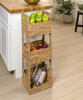 Gunter 35.5 Inch Coastal Handwoven Water Hyacinth 3 Tier Freestanding Storage Tower With Metal Frame And Handles in kitchen
