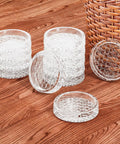 Straight Up Floor Savers Round Rubber Furniture Caster Cups 12 Piece Set Clear Non Slip Chair Coasters stacked on wooden surface.