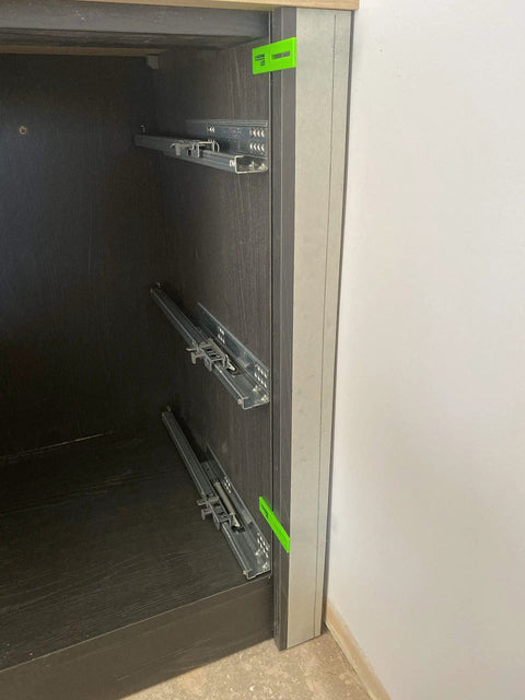 Green color-coded Pro Grade Scribe Jig Installers Set for woodworking and carpentry in a cabinet for precise fittings.