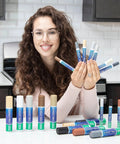 Person holding various colors of Gray Tile Grout Paint Marker For Quick DIY Recolor Waterproof Grout Pen With Colorant And Sealer