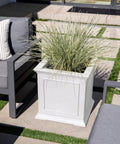 Cube Plastic Planter For Indoor And Outdoor Use, All Weather Durable Square Plant Pot With Drainage Holes, Great For Flowers Tall Plants And Trees, Modern Estate Style For Patio Or Front Porch displayed on a patio