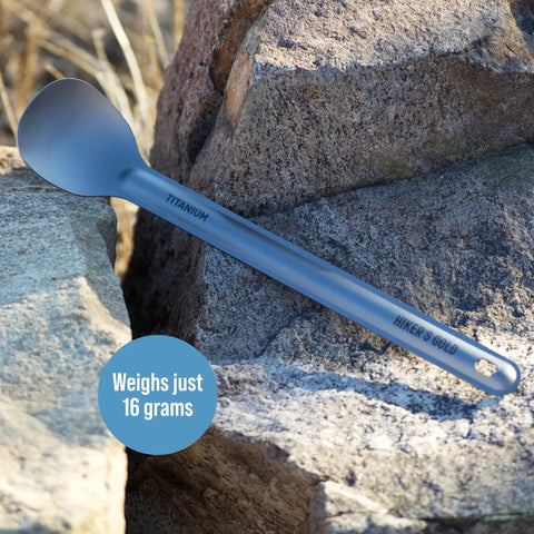 Ultralight Titanium Camping Spoon For Backpacking And Hiking, 16g Silver Utensil With 8.5 Inch Reach on rocks