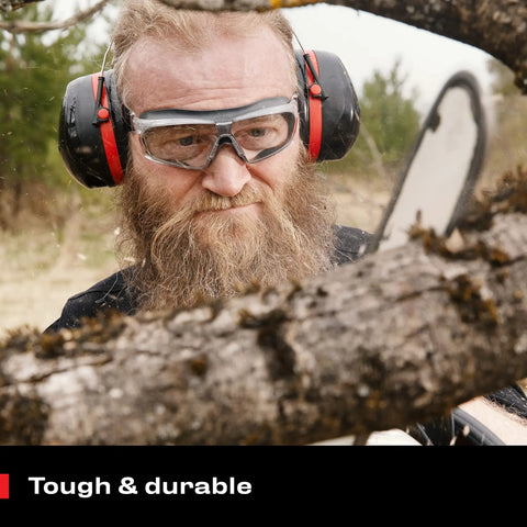 Person wearing Anti Fog Safety Goggles For Men And Women With Premium Coating, adjustable headband, using chainsaw