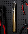 Two Piece Brass Drift Pin Punch Set Non Marring Mechanic Chisel Punches for vehicles auto repair cars trucks and vans visible on pegboard