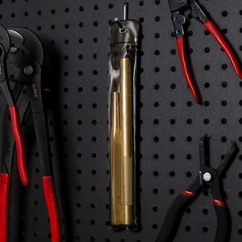Two Piece Brass Drift Pin Punch Set Non Marring Mechanic Chisel Punches for vehicles auto repair cars trucks and vans visible on pegboard
