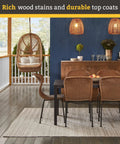 Outdoor dining area with wicker furniture, hanging chair, and wood deck protected by Transparent Cedar Wood Stain And Sealer That Keeps Wood Lookin Natural While Protecting It With A Resin And Oil Blend, UV Weatherproof Shield For Decks Fences And Outdoor Furniture, 1 Quart.