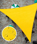 Overhead view of Yellow Triangle Shade Sail 16 Ft By 16 Ft By 16 Ft Waterproof Canopy blocking rain on paved patio square