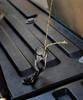 CamJam Rope Tie Down Tightener with Carabiner Clip securing a load on a truck bed, knot free and lightweight, 2 pack.