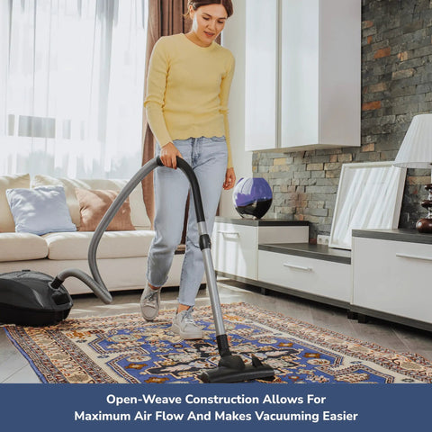 Woman vacuuming rug over Natural Non Slip Rug Pad For Hardwood Floors And Hard Surfaces Low Profile 2 Ft X 6 Ft