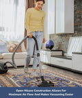 Person vacuuming a rug with natural rubber rug grip non slip pad 3 by 5 inch low profile rug pad for hardwood and hard surface floors