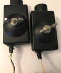 41A4373A Safety Sensors For Garage Door Openers showing two black units with metal bolts and cables, compatible with LiftMaster and Chamberlain