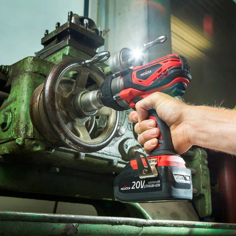 Beefy 20V Cordless Impact Wrench Kit With 300 Ft Lb Torque used on machinery in workshop setting