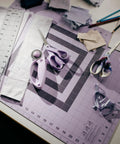 18 By 24 Inch Self Healing Cutting Mat For Sewing And Crafting, Dope Lilac Mountain Haze Color, Durable Grid Surface With Easy Read Measurements And 30 45 60 Degree Bias Lines For Precise Angle Cuts, Great For Quilting, Scrapbooking, Gift Wrapping, with scissors and fabric scraps