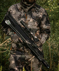 Hunter holding crossbow with Pioneer Airbow Arrow Pack with 375 Grain Hand Fletched Helical Vanes, 26 Inch Pure Carbon Fiber, 250 Spine.